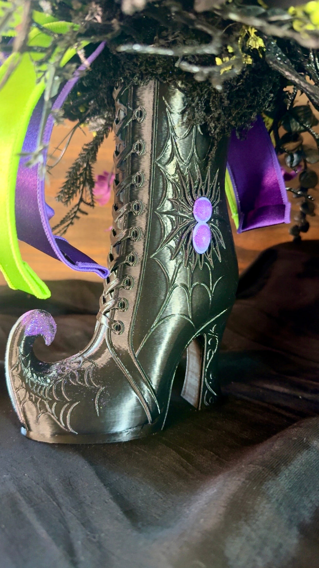 14. Witchy Boot Halloween Floral Arrangement – Purple, Green & Black