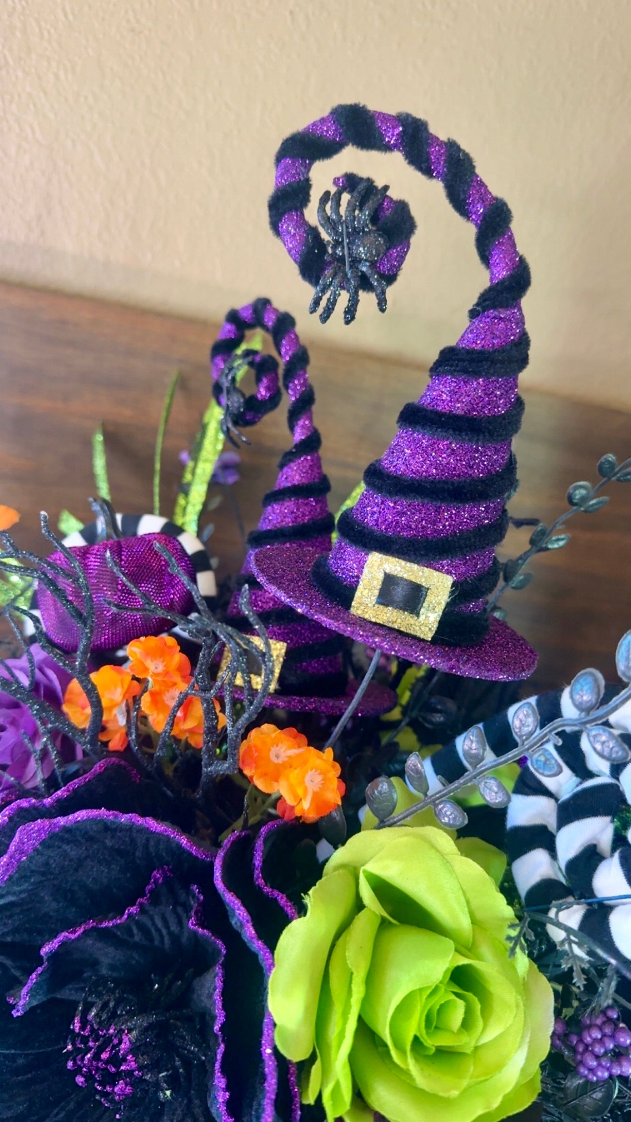 14. Witchy Boot Halloween Floral Arrangement – Purple, Green & Black